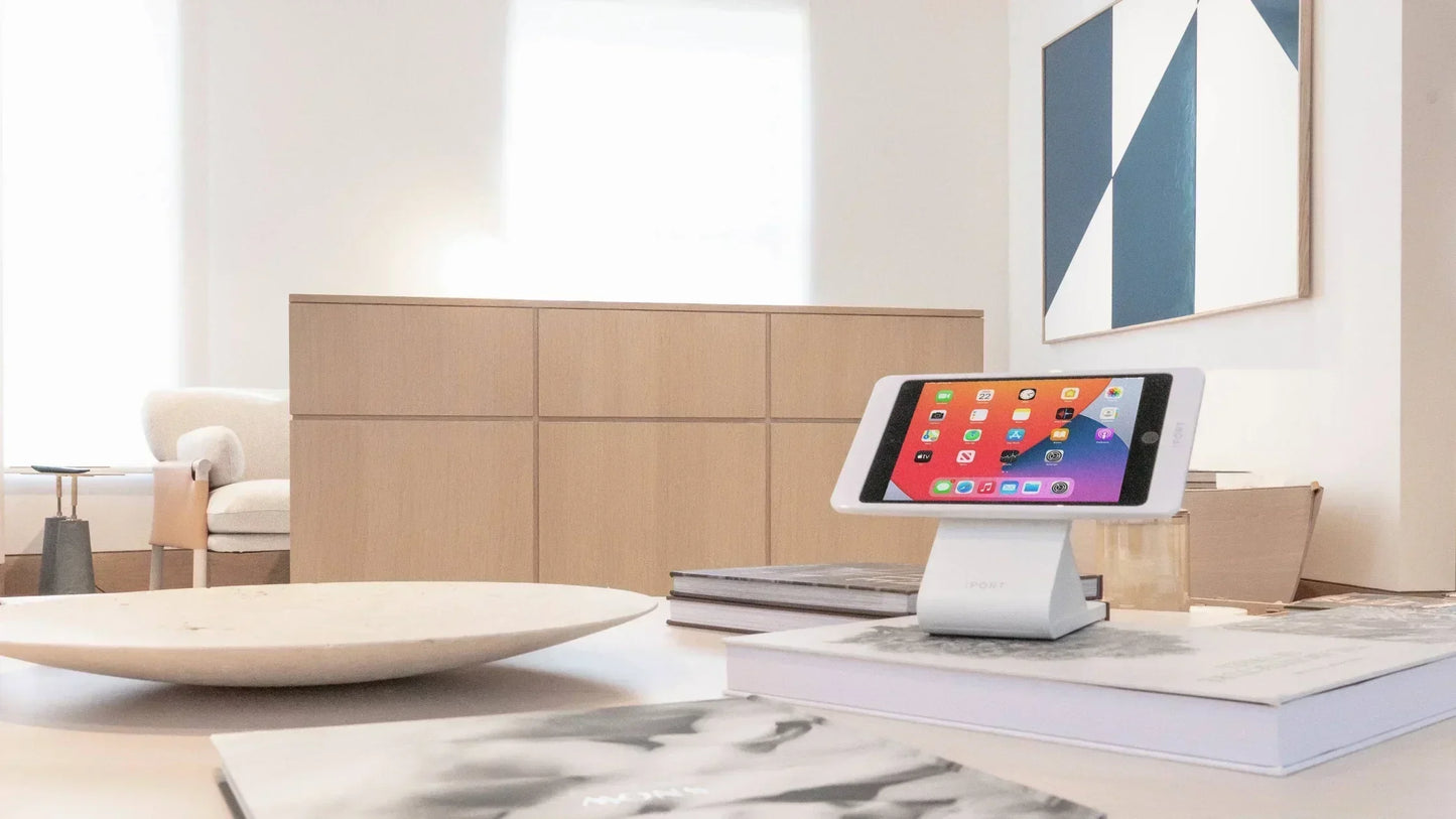 iPORT Connect Pro iPad case and dock on display in hotel room for professional tablet mounting and rotation