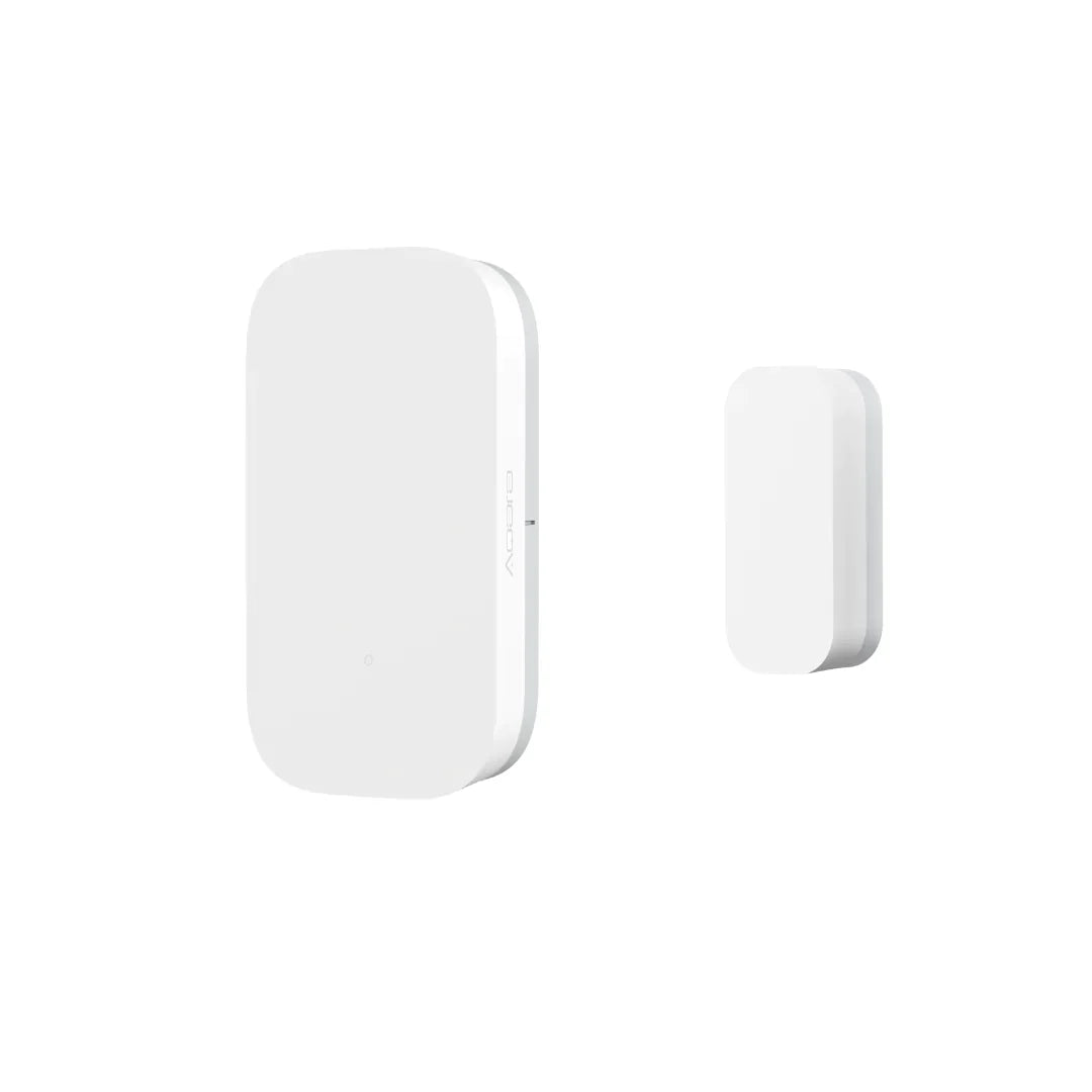 a close up of a door and window sensor on a white background
