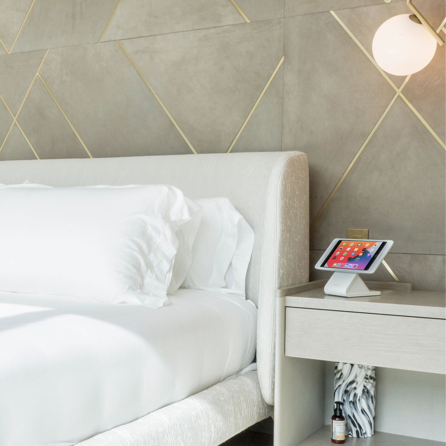 Iport Case and Basestation displayed in modern hotel room