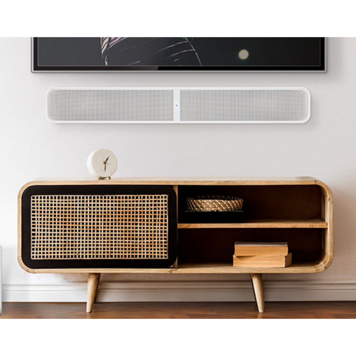 
                  
                    White Bluesound Pulse Soundbar + installed in living room
                  
                