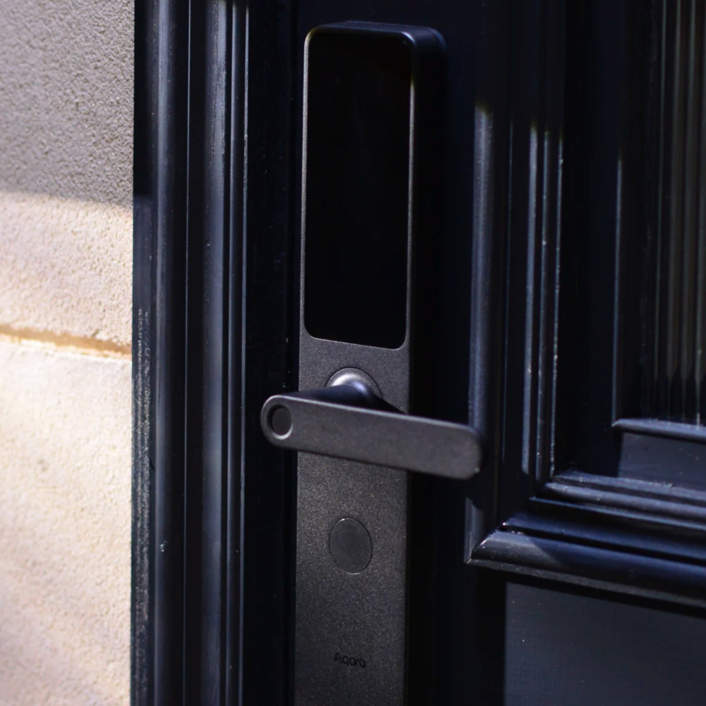 Aqara Smart Door Lock A100 shown on black door