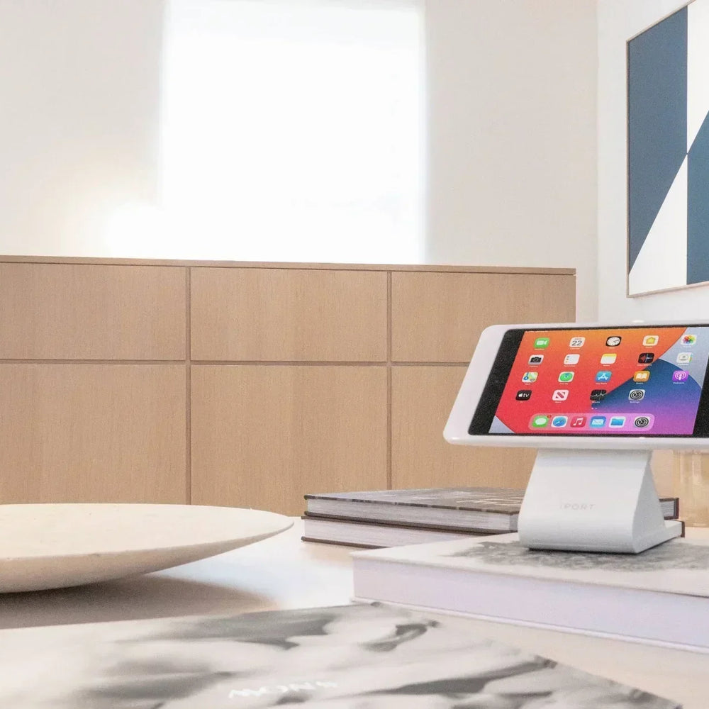 iPORT Connect Pro iPad case and dock on display in hotel room for professional tablet mounting and rotation