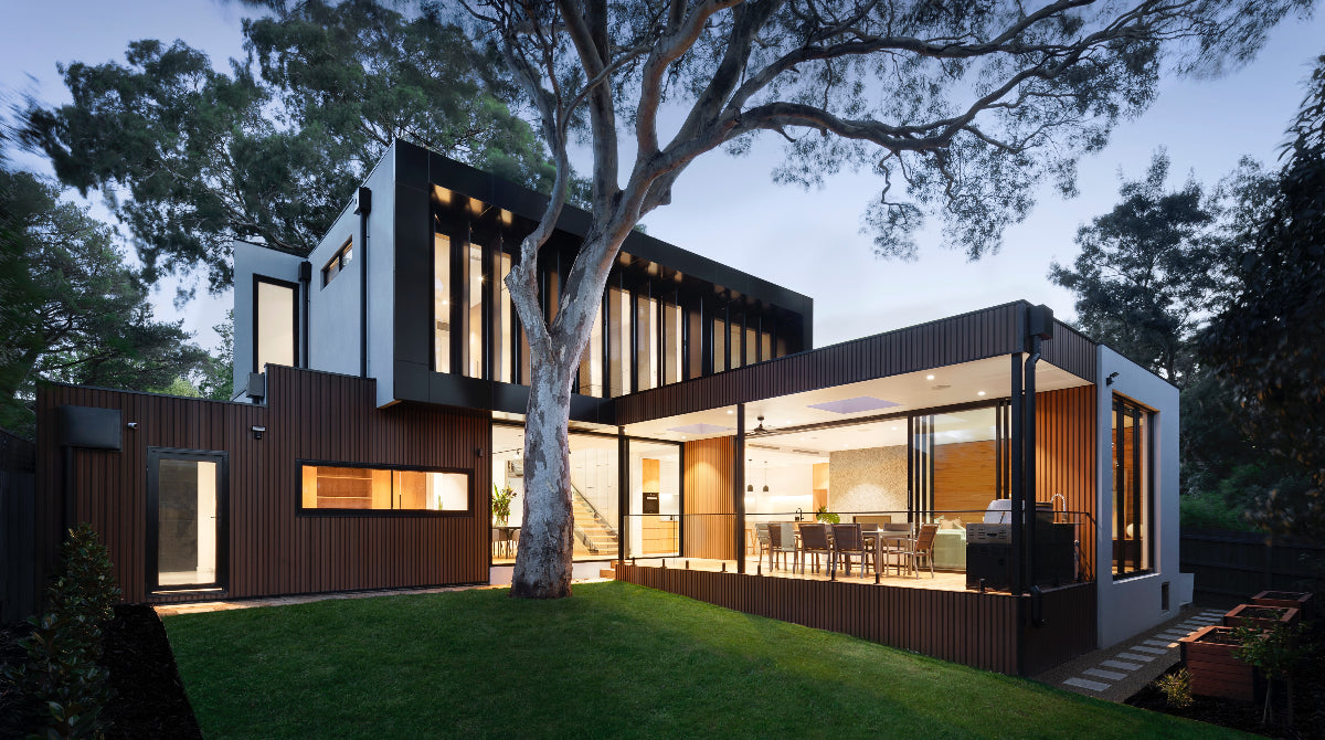 Modern Australian home, exterior with warm lighting