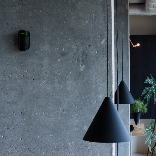 
                  
                    AJAX MotionProtect on a concrete wall
                  
                