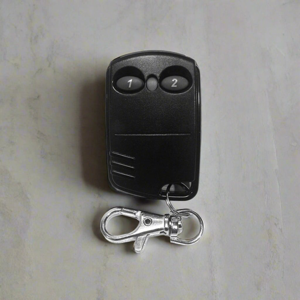 
                  
                    Close-up of the iKey Transmitter wireless access control device with one-touch functionality
                  
                