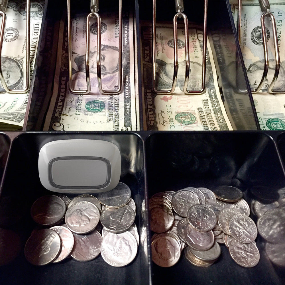 
                  
                    a till with an AJAX Smart Button installed inside
                  
                