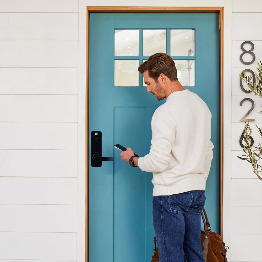 Yale Unity Entrance Lock installed on a Blue door