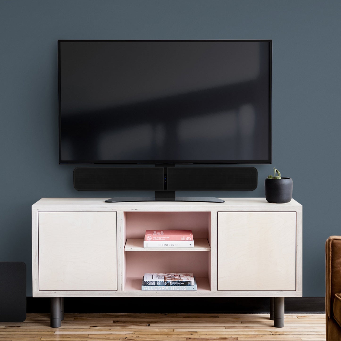 Bluesound Pulse Soundbar TV Stand installed in living room