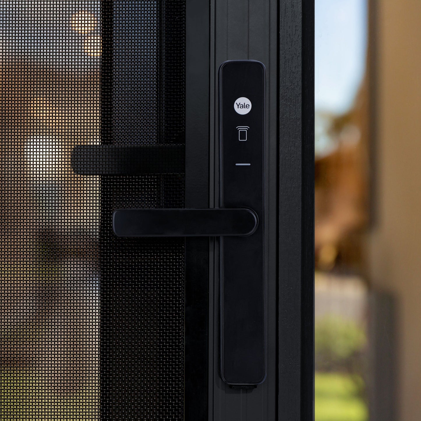 
                  
                    Yale Unity Screen Door Lock on black security screen door
                  
                